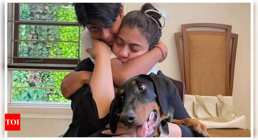 Kajol shares a tight hug with son Yug as they celebrate their pet dog's 2nd birthday; fans REACT |